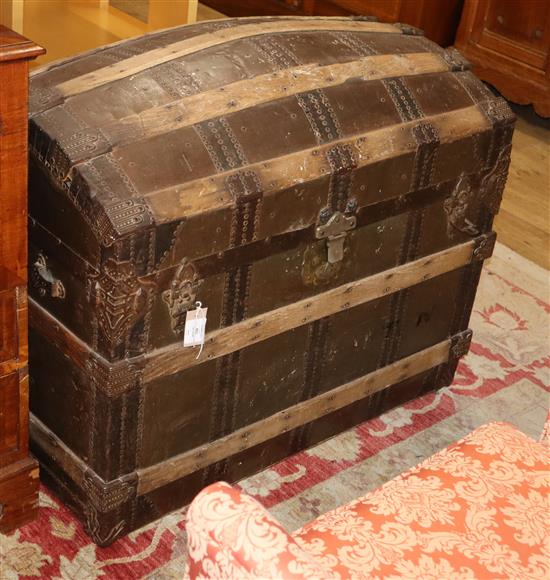 A Victorian brass studded, ash bound domed topped leather trunk